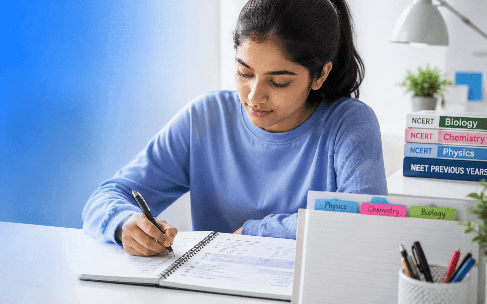 NEET aspirant solving previous year questions with NCERT textbooks